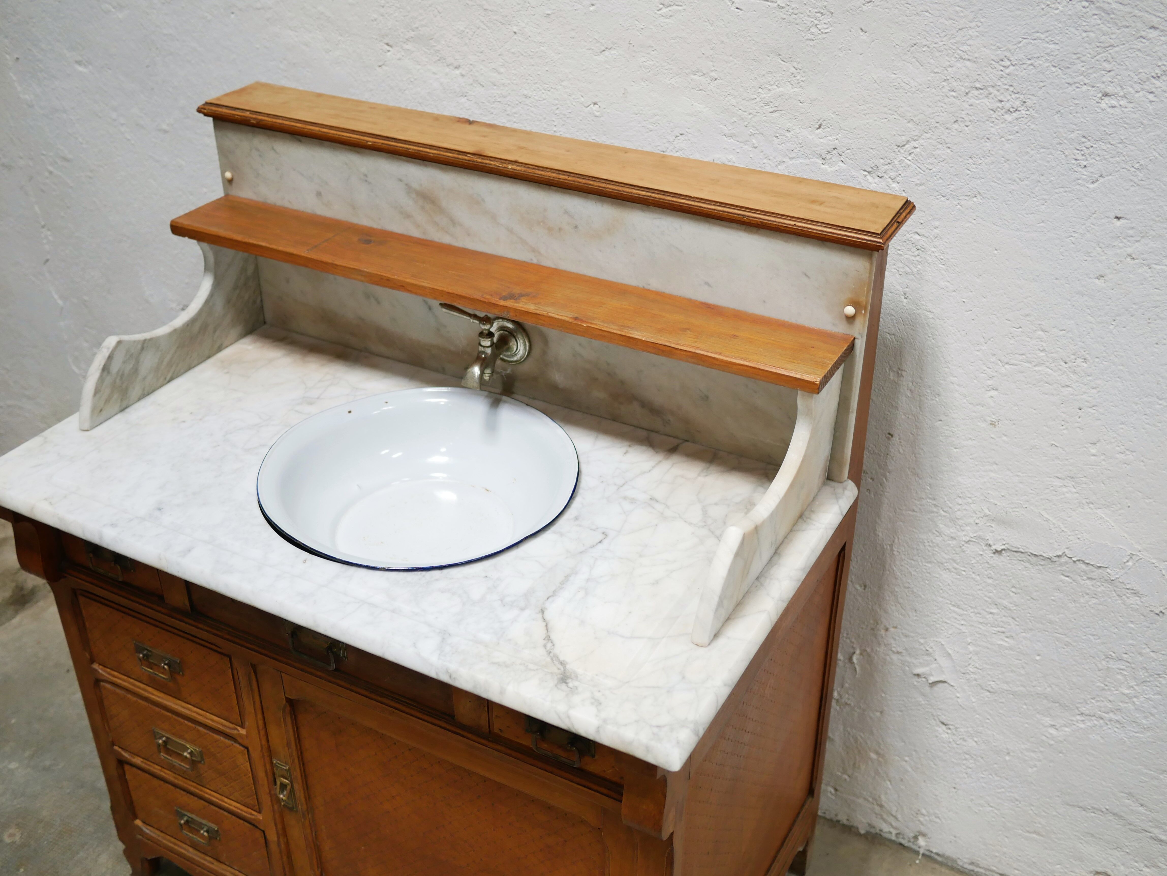 Antique washbasin cabinet in marble and wood