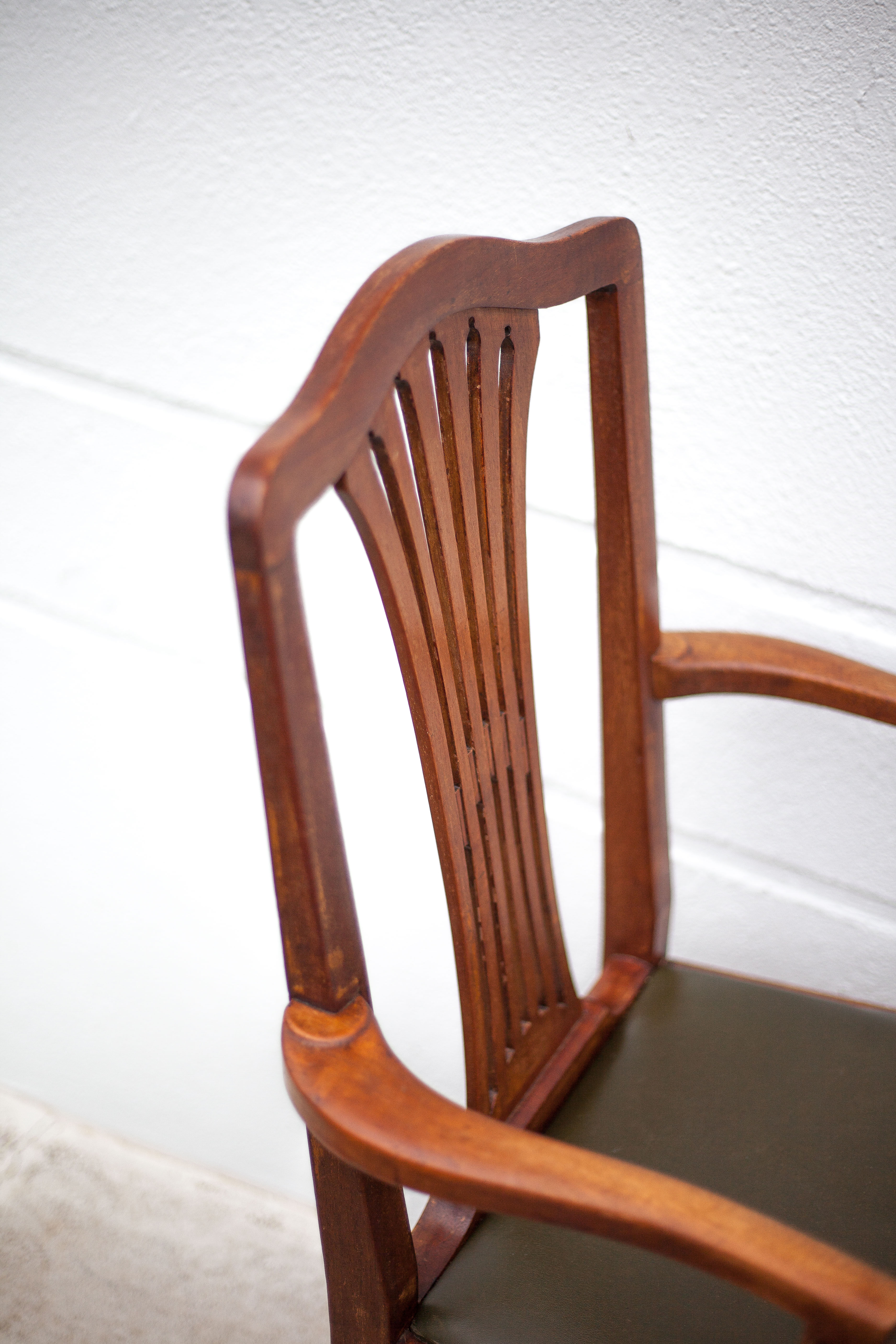 Art Nouveau armchair, wooden armchair with green leather seat, guimard style legs, living room, library