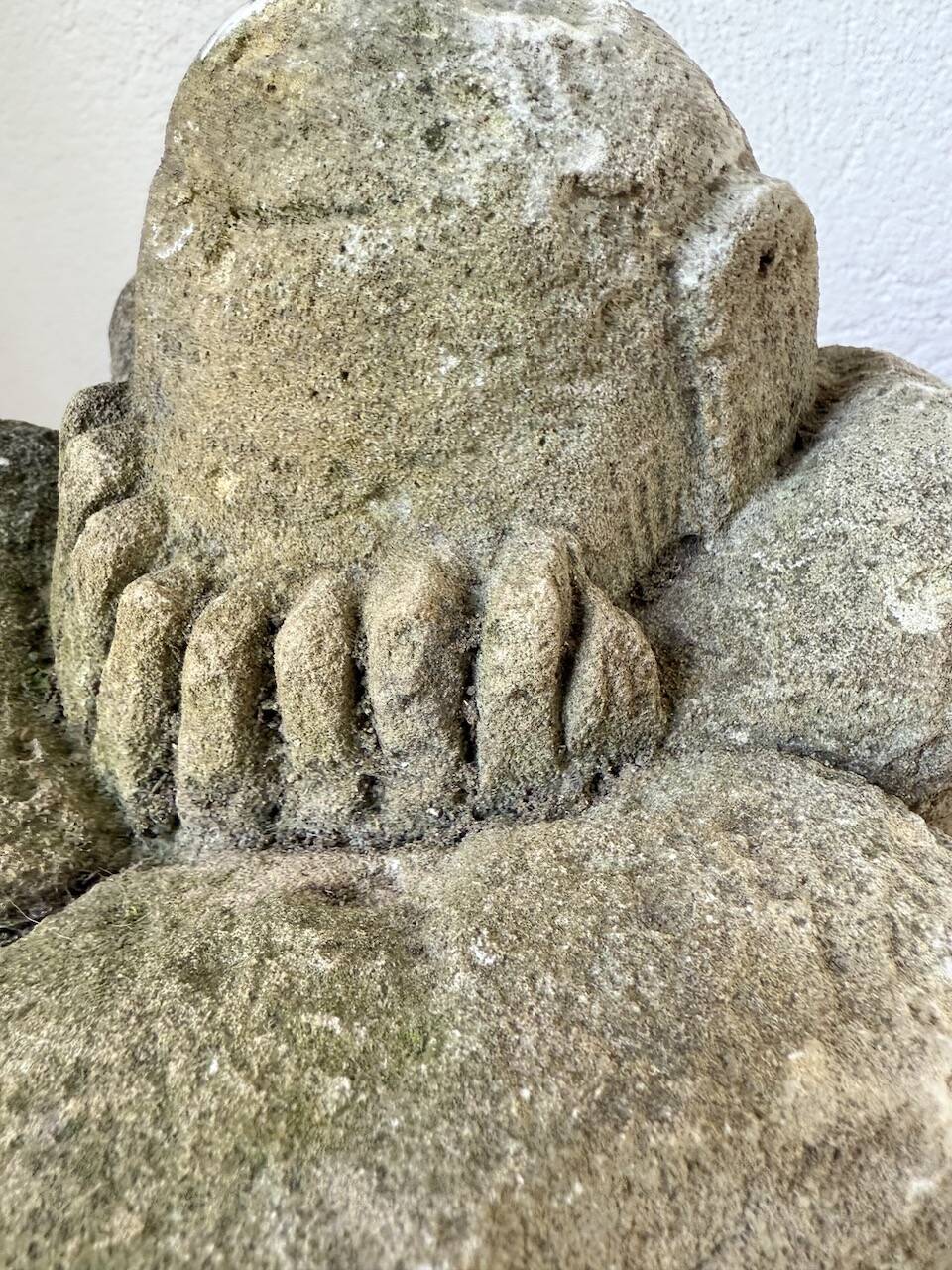 Stone sculpture of a man