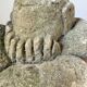 Stone sculpture of a man