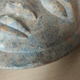 African stone face sculpture