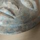 African stone face sculpture