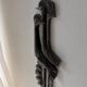 Brutalist wall sculpture with birds Ars Munda