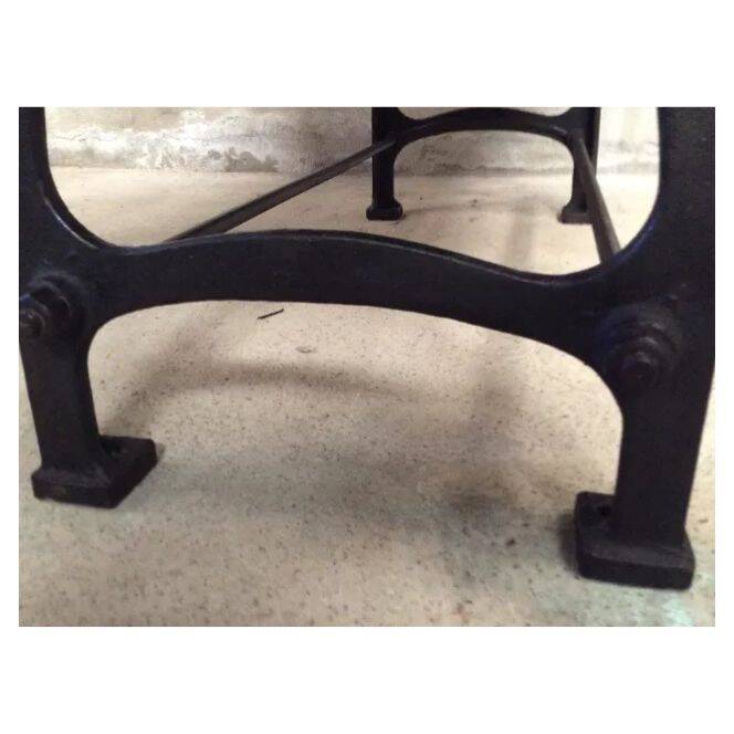 Industrial dining table with cast iron base
