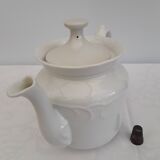 White earthenware teapot