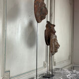 Three cast-iron and terracotta façade decoration lions, around 1880.