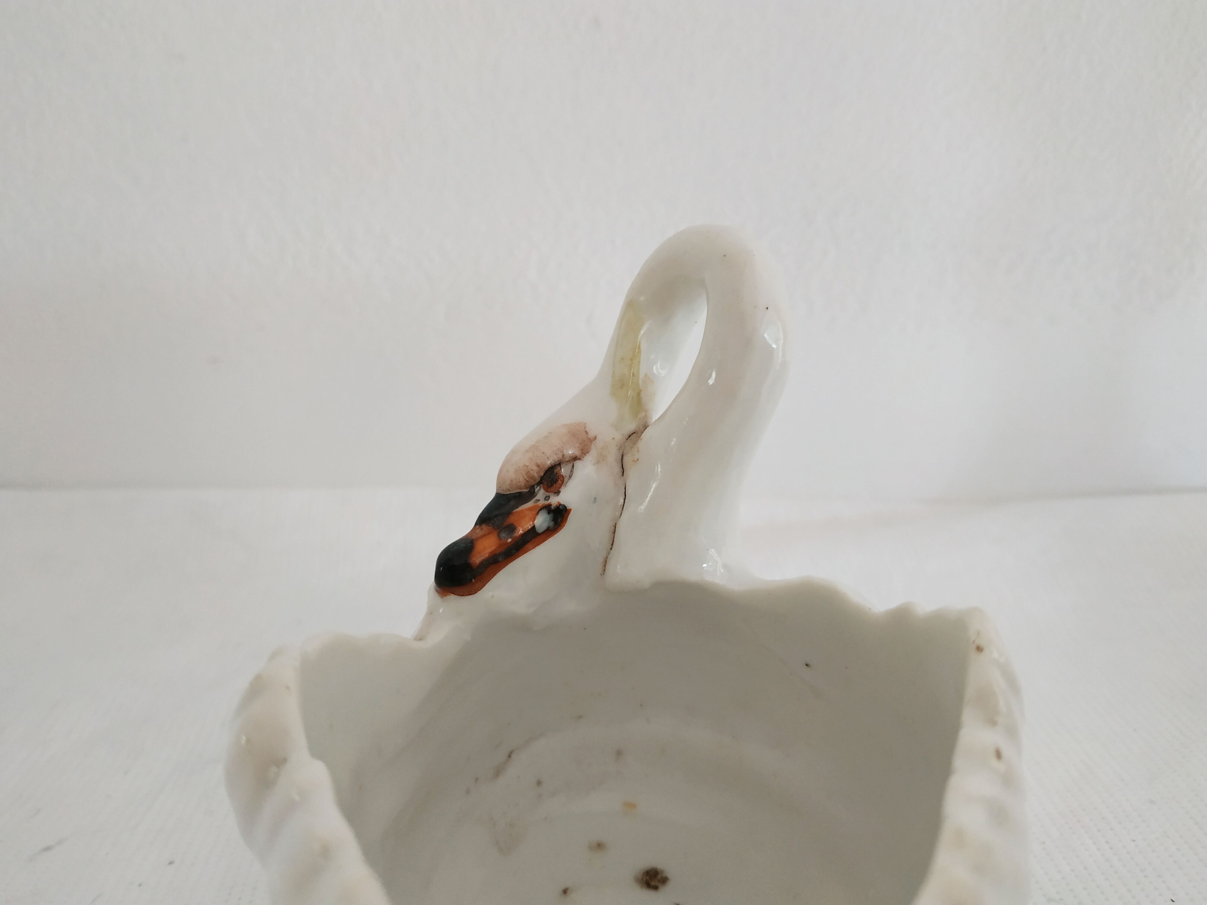 Mustard and salty swans, circa 1900