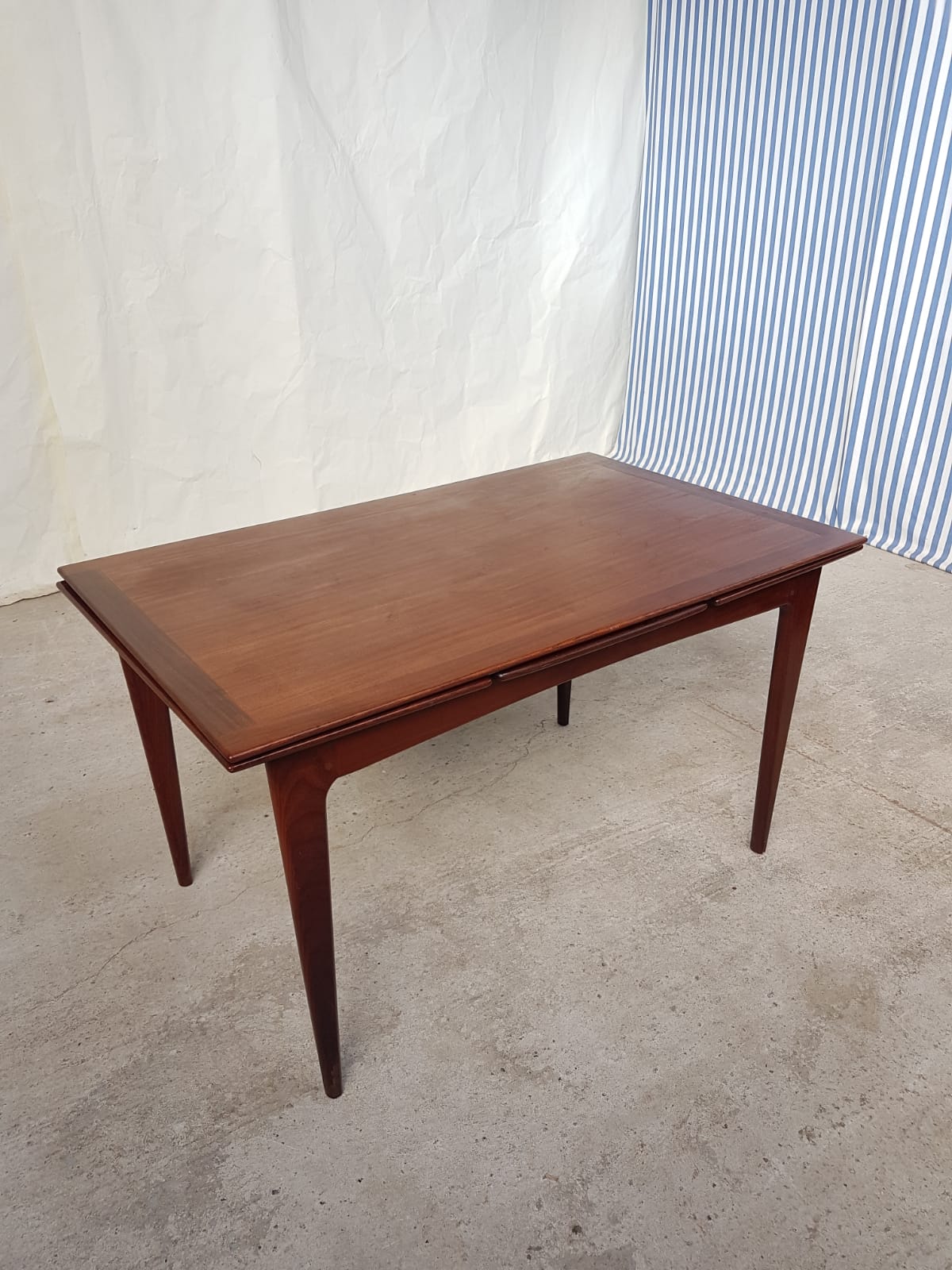 Teak extending dining table by Younger