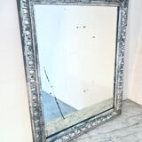 Old mercury mirror, in carved wood with silver leaf.
