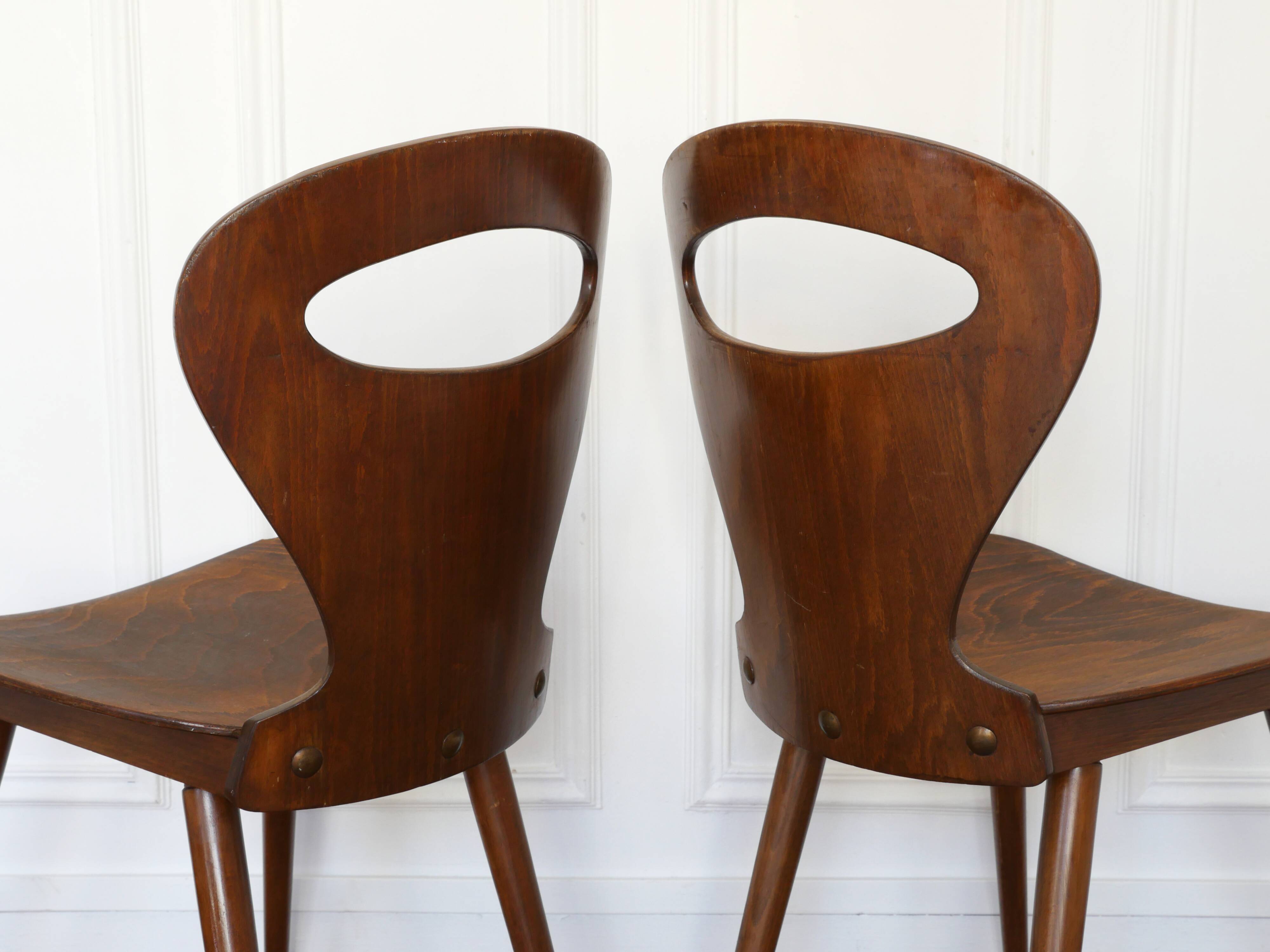 Suite of two Baumann Fourmi chairs