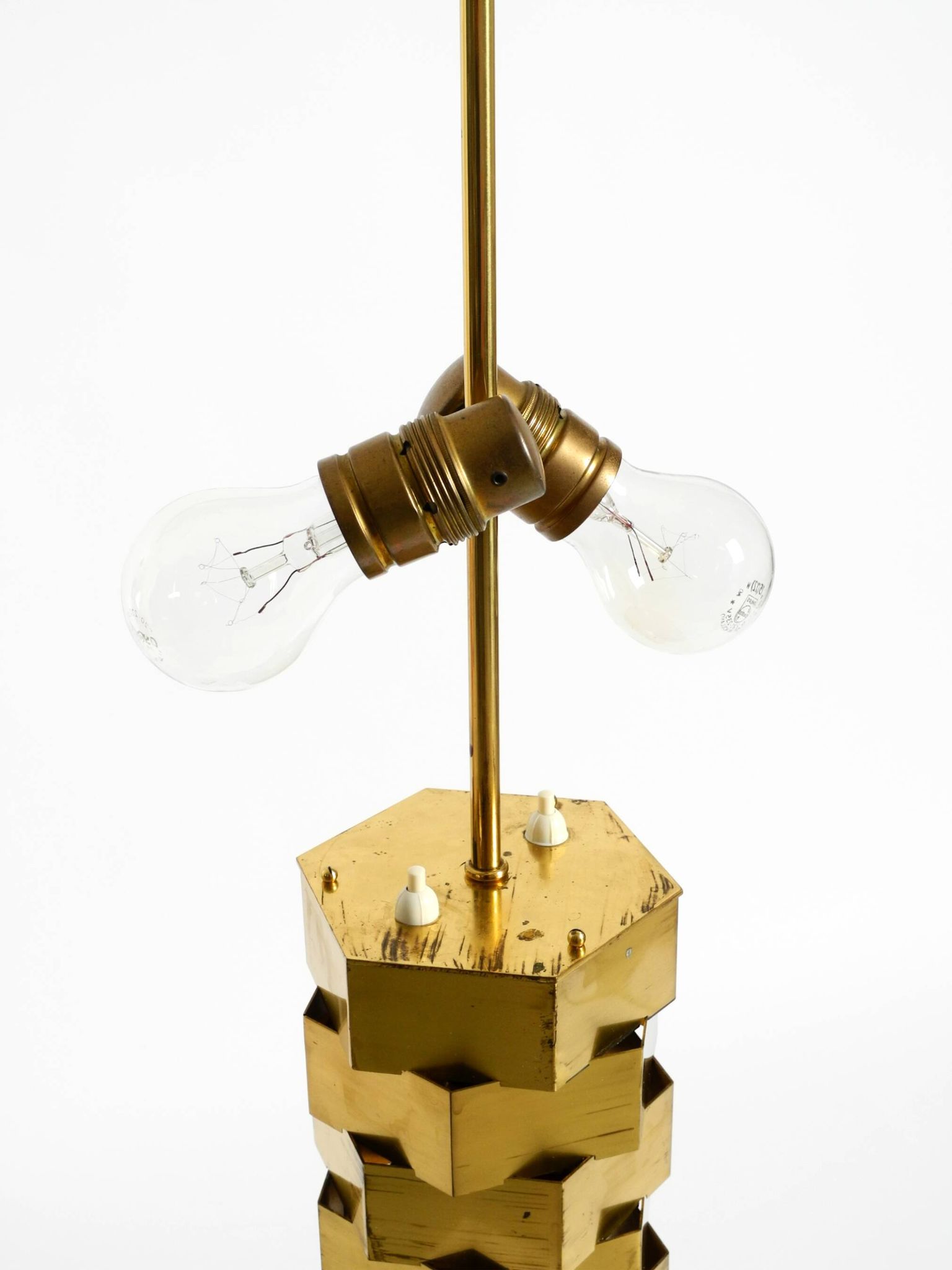 1960s brass table lamp by Vereinigte Werkstätten with an illuminated base