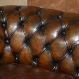 Restored leather Chesterfield sofa, walnut legs.