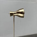 Minimalist brass floor lamp from the mid-century by Dieter Schulz for Wohnbedarf Ag, 1950s.