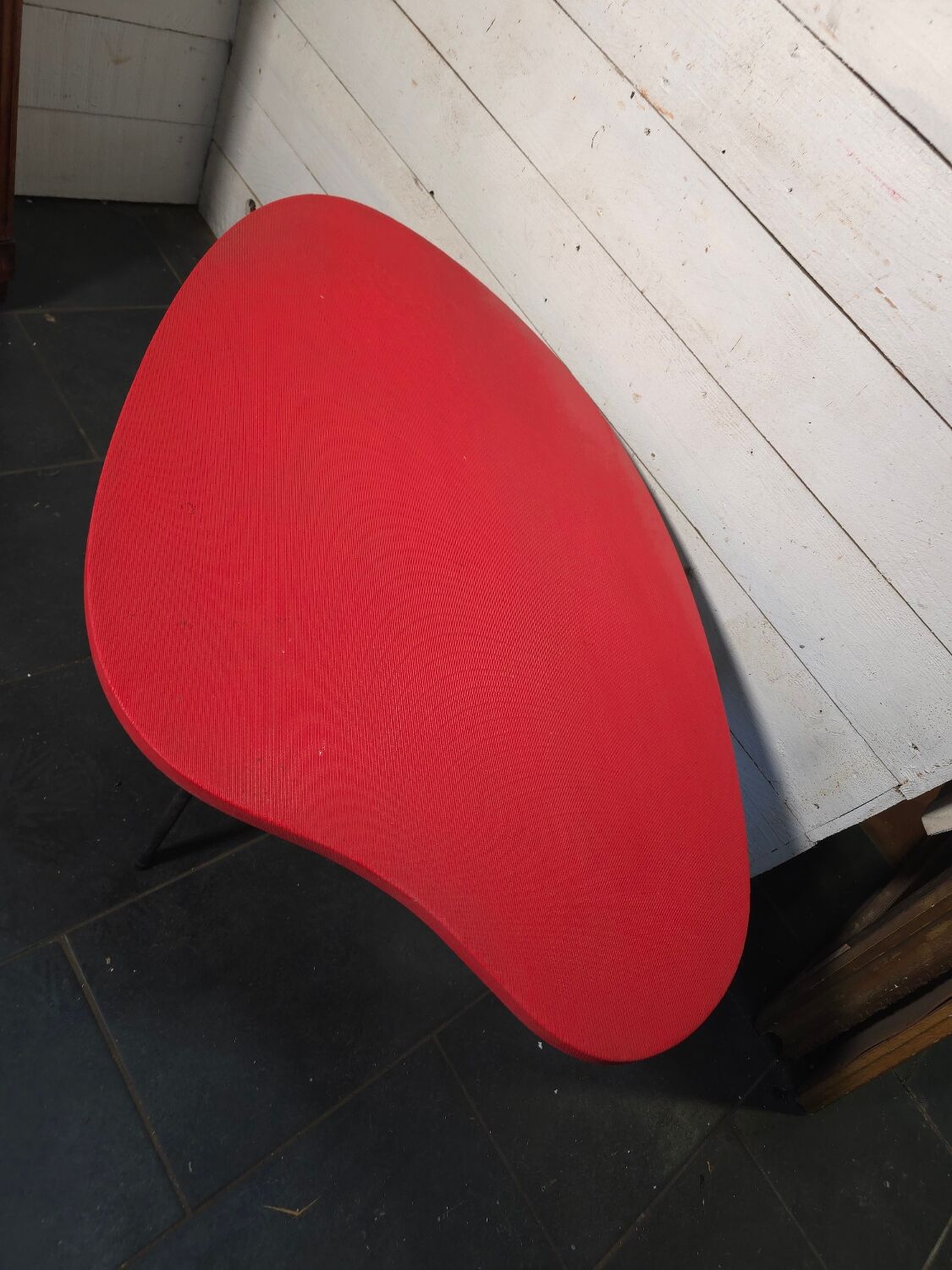Vintage coffee table from the 1960s in red.