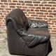 Pair of patinated leather club armchairs