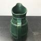 Former green ceramic pitcher shape tonneau