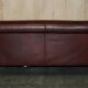 Vintage Art Deco leather sofa, three-seater, feather cushions.