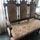 Historicist three-seater canapé in ebonised wood.