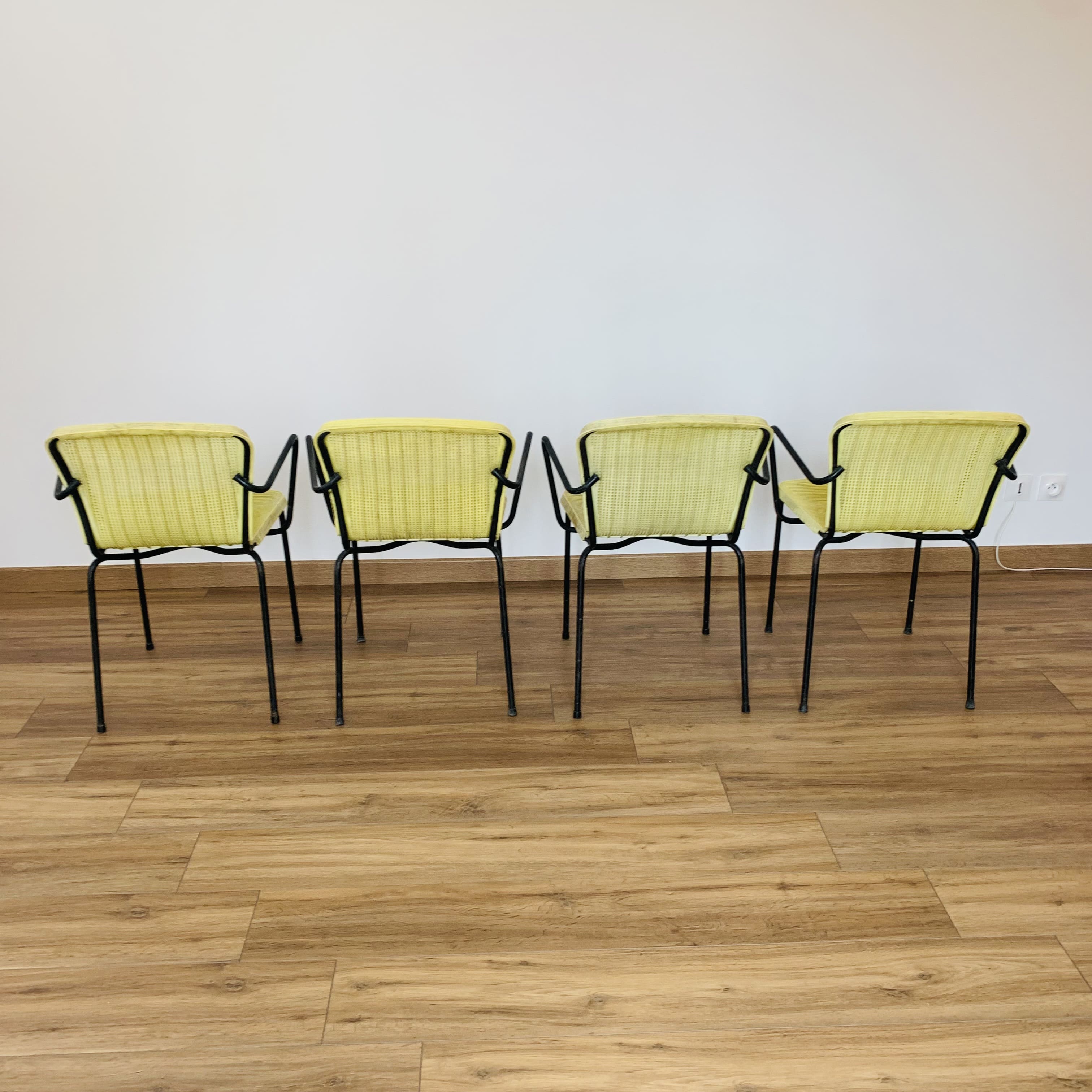 4 yellow outdoor armchairs