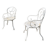 Duo of wrought iron armchairs