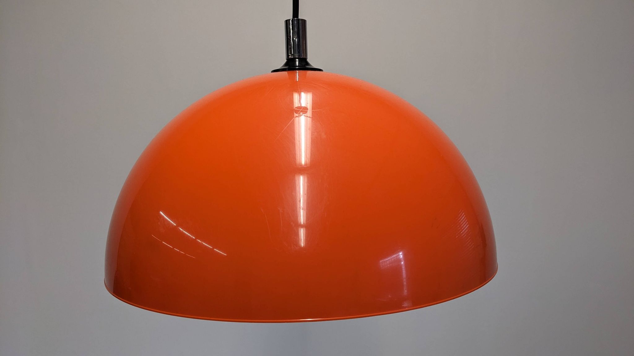 Suspension dome Space Age in hard orange plastic, France circa 1970.