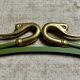 Rare set of swan neck coat hooks with mirror frame attributed to Maison Jansen, France, 1950s.