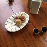 White and gold ceramic plate