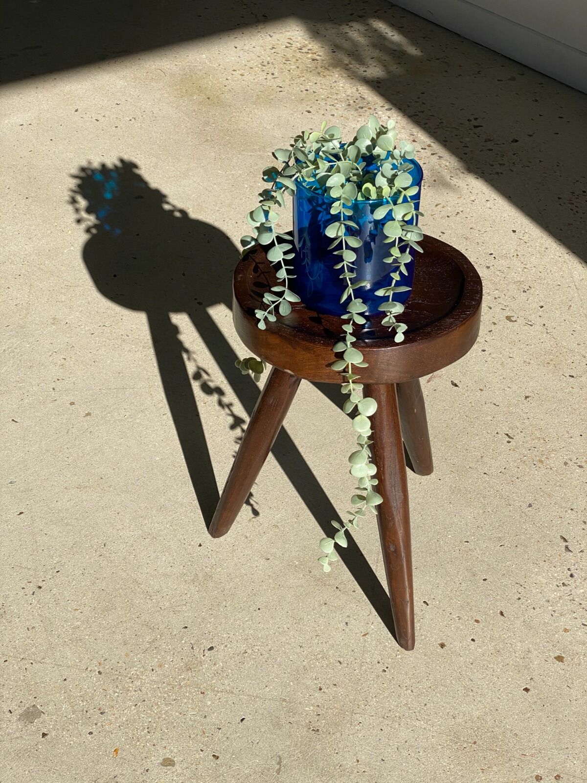 Brown solid wood stool seated circular dug