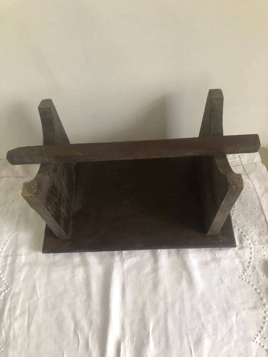 Old small hand-carved bench