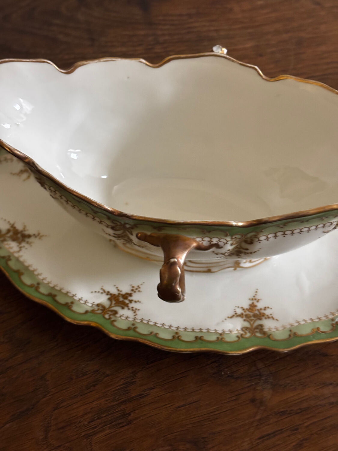 Vintage green Limoges porcelain gravy boat with gilt trim