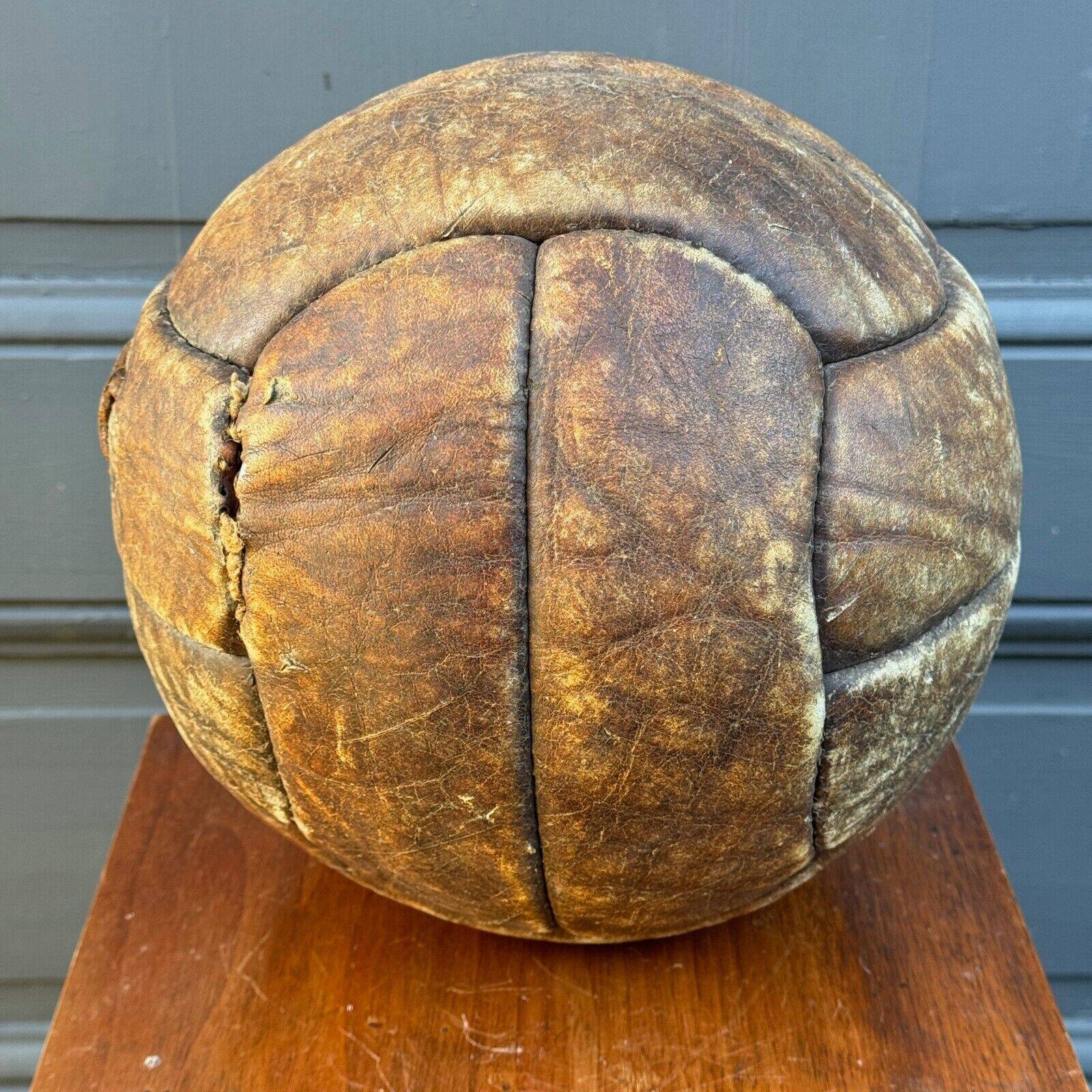 Mid-20th century leather soccer ball with visible stitching and beautiful patina