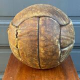 Mid-20th century leather soccer ball with visible stitching and beautiful patina