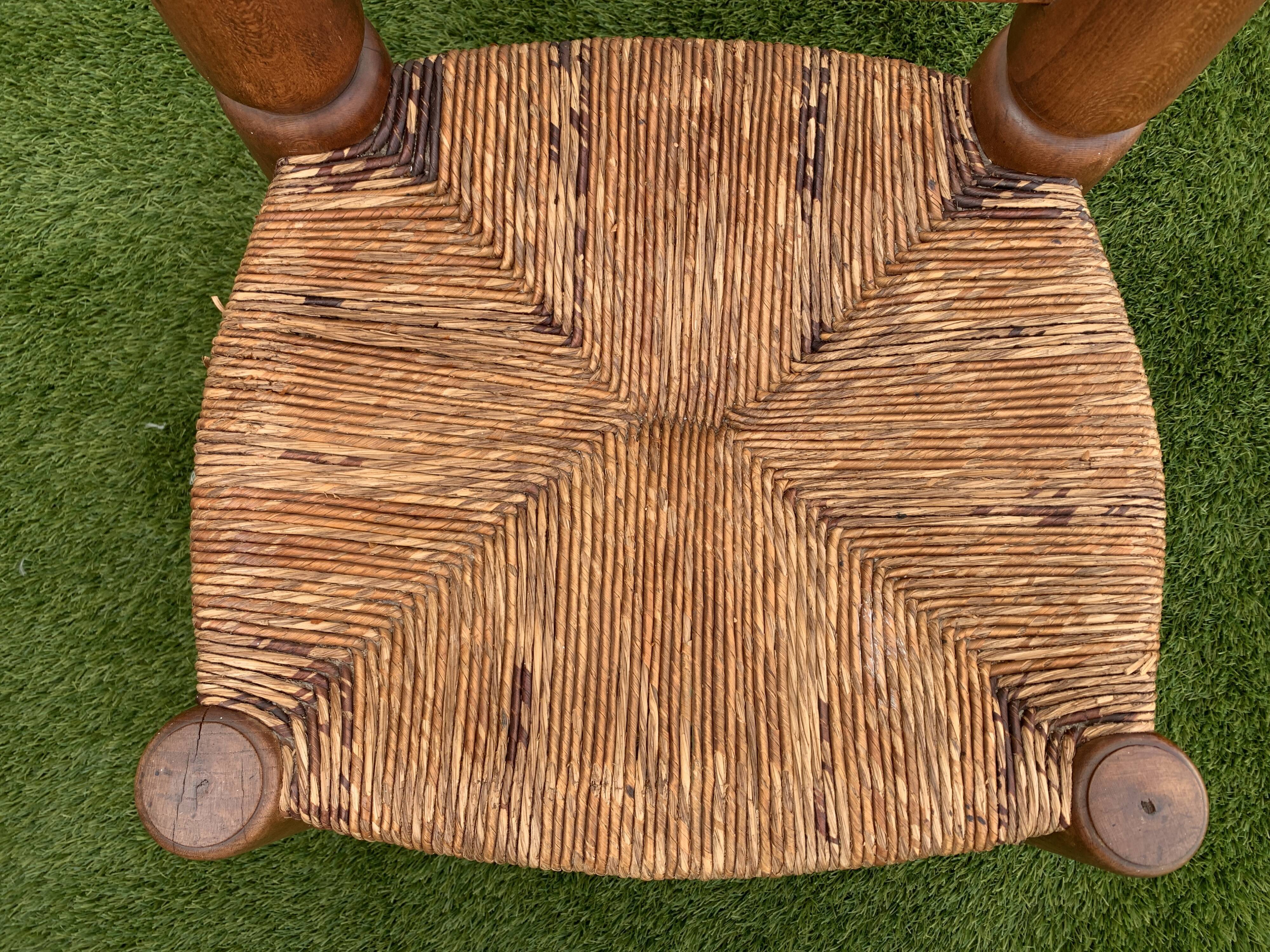 Pair of antique low fire chairs made of wood and straw