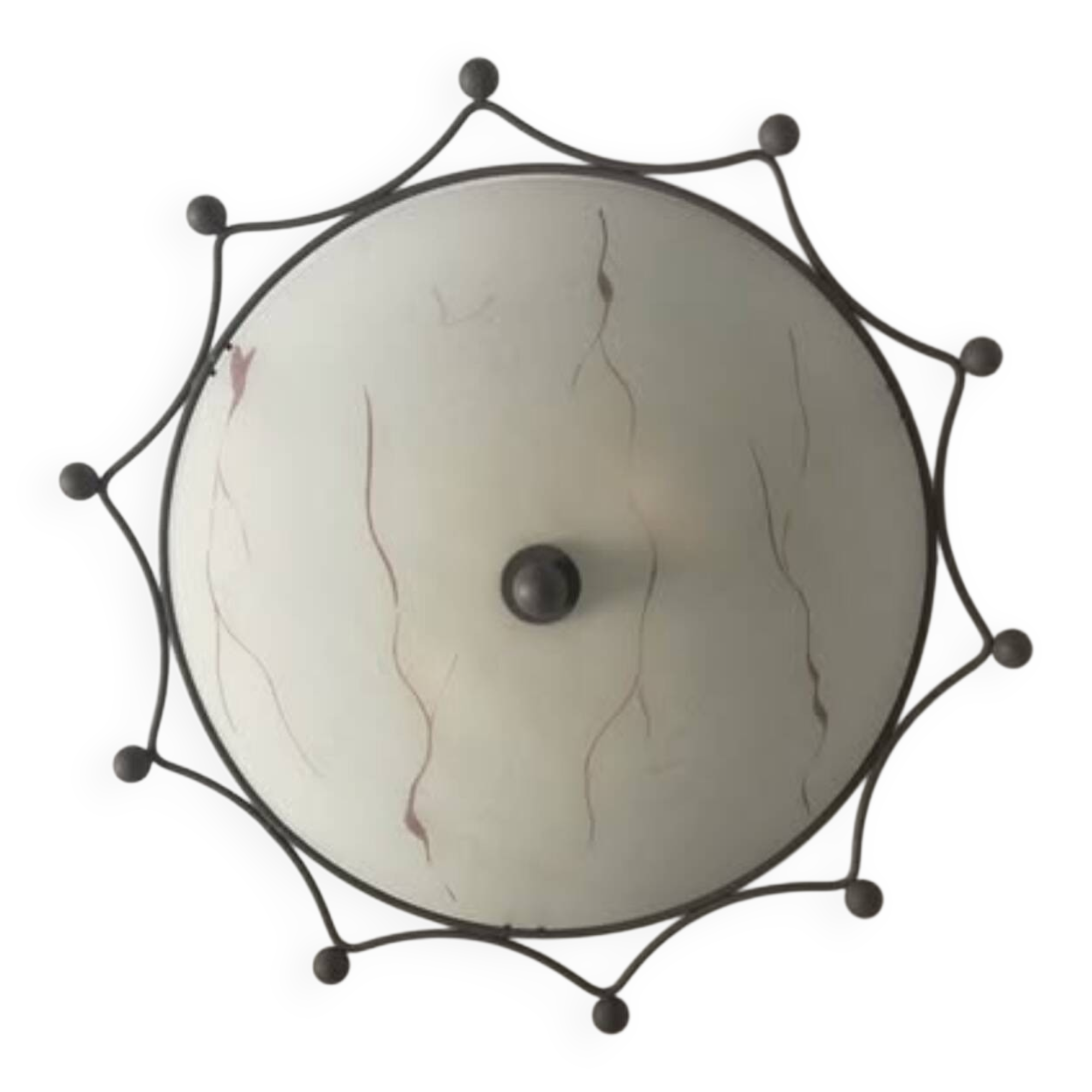 Round ceiling light with a wrought iron frame.