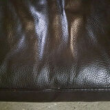 Fauteuil design en cuir marron