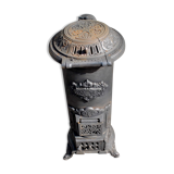Poêle décoratif ancien en fonte noir Germare charbon bois