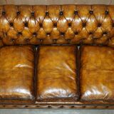 Vintage Chesterfield leather sofa bed, fully restored, circa 1940.