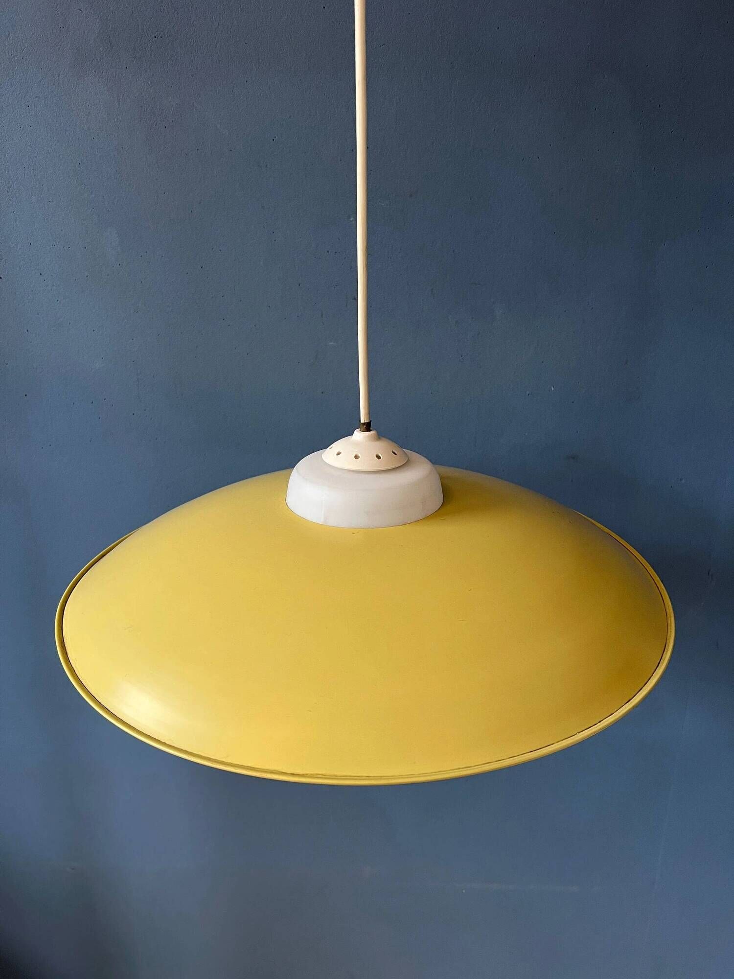 Danish mid-century suspension with opaline glass shade and yellow metal cover.
