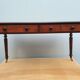 English desk with 2 drawers on green leather