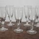 8 antique champagne flutes in engraved crystal and twisted foot