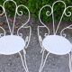 Salon de jardin 1 table 4 fauteuils en fer forgé blanc ancien.