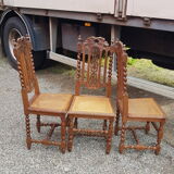 Carved antique chairs with rattan seat
