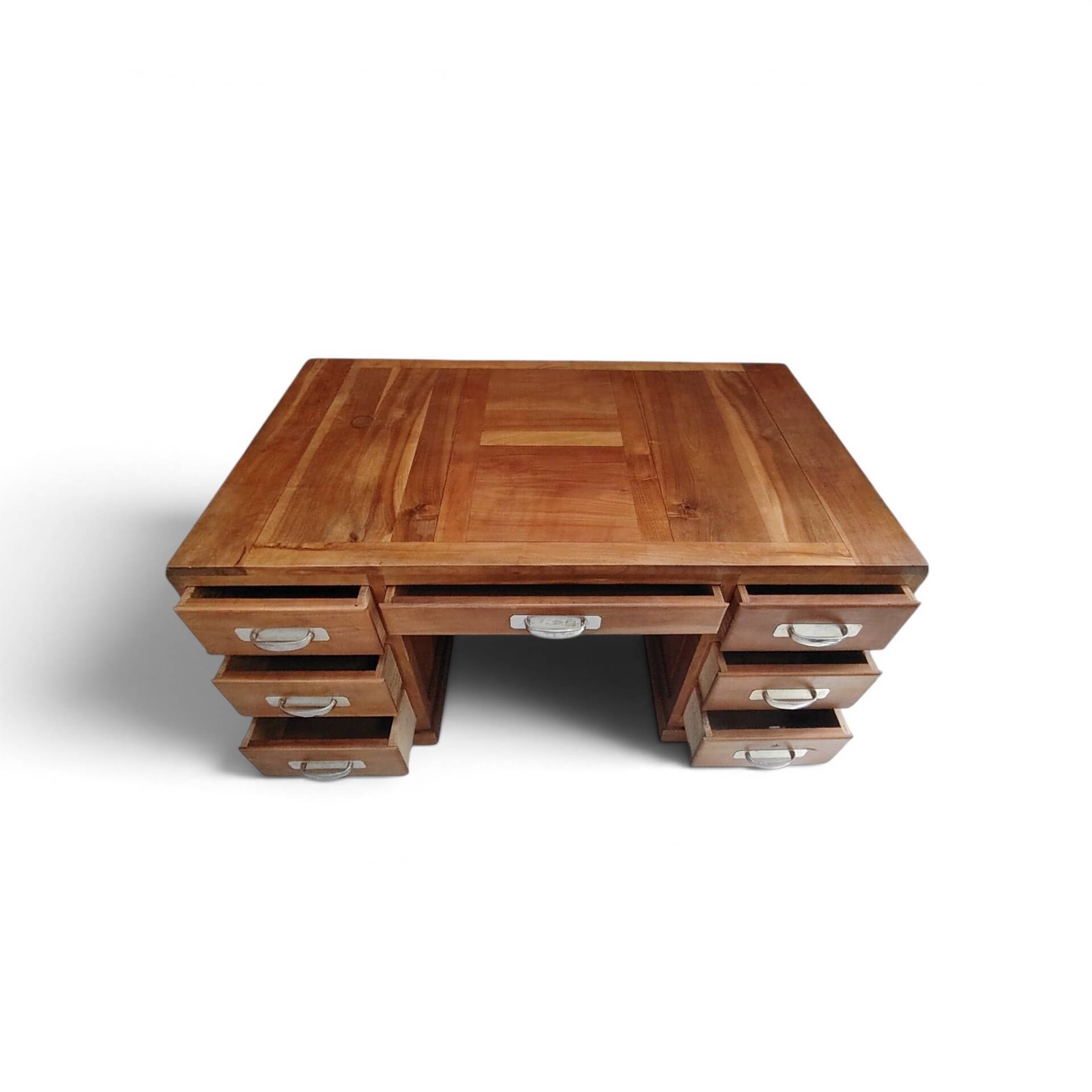 Large modernist minister's desk in solid lemon wood with 7 drawers.