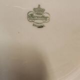 Breakfast set with tea or coffee in porcelain.