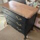 Patinated black dresser