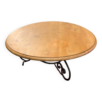 Round wood and wrought iron coffee table