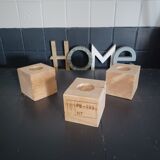 Set of three wooden candlesticks