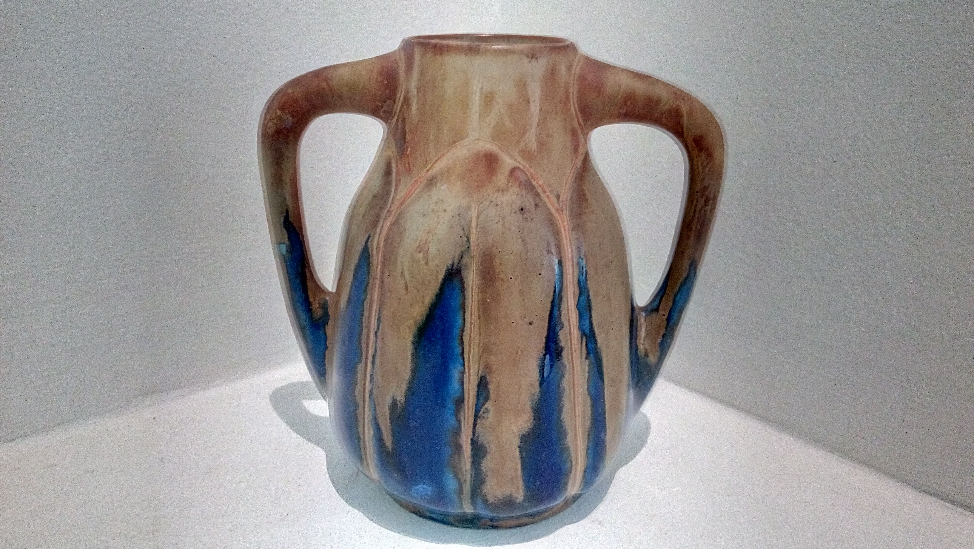 Blue enamelled flamed sandstone vase by Méténier