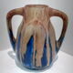 Blue enamelled flamed sandstone vase by Méténier