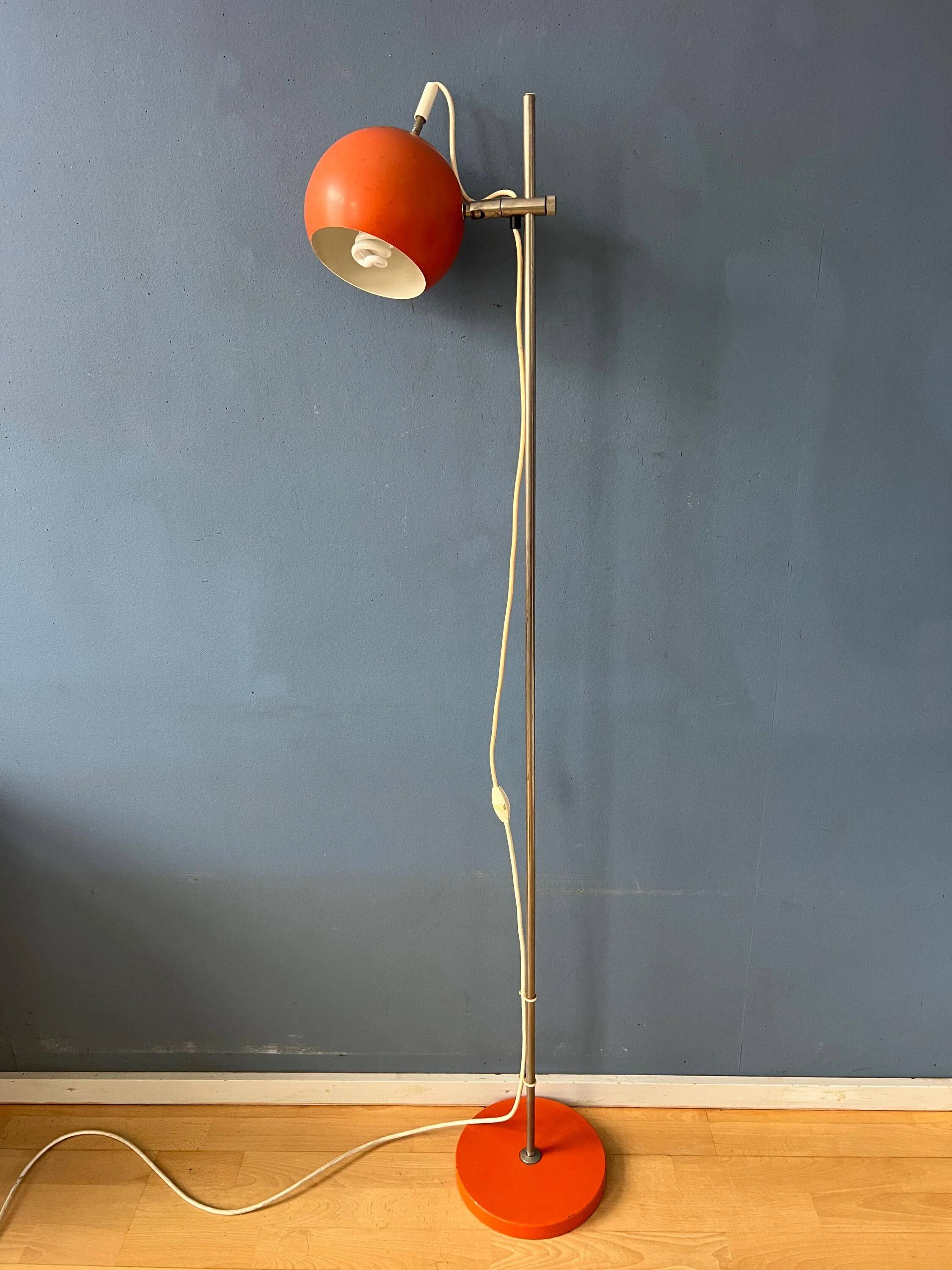 Mid-Century orange floor lamp with "eyeball" shade